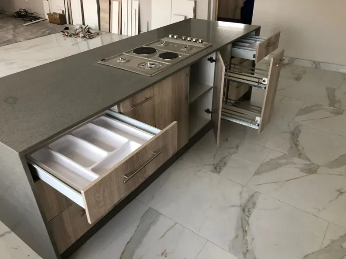 Cupboards featuring soft-close door hinges and gray colored body.
